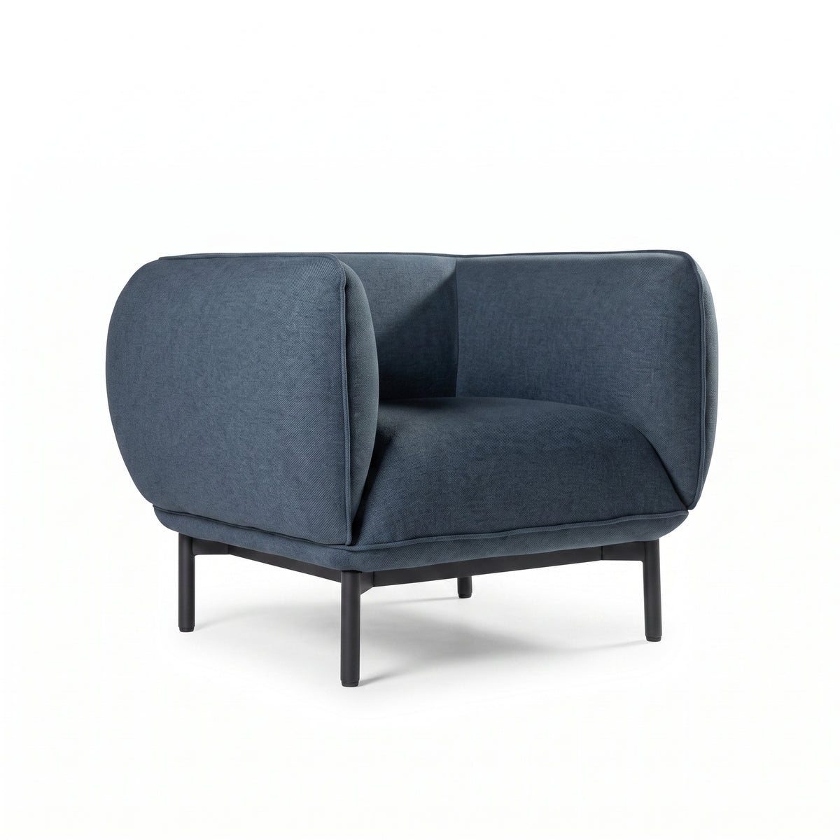 Sillón Sevilla tapizado en azul petróleo, vista tres cuartos sobre fondo blanco.