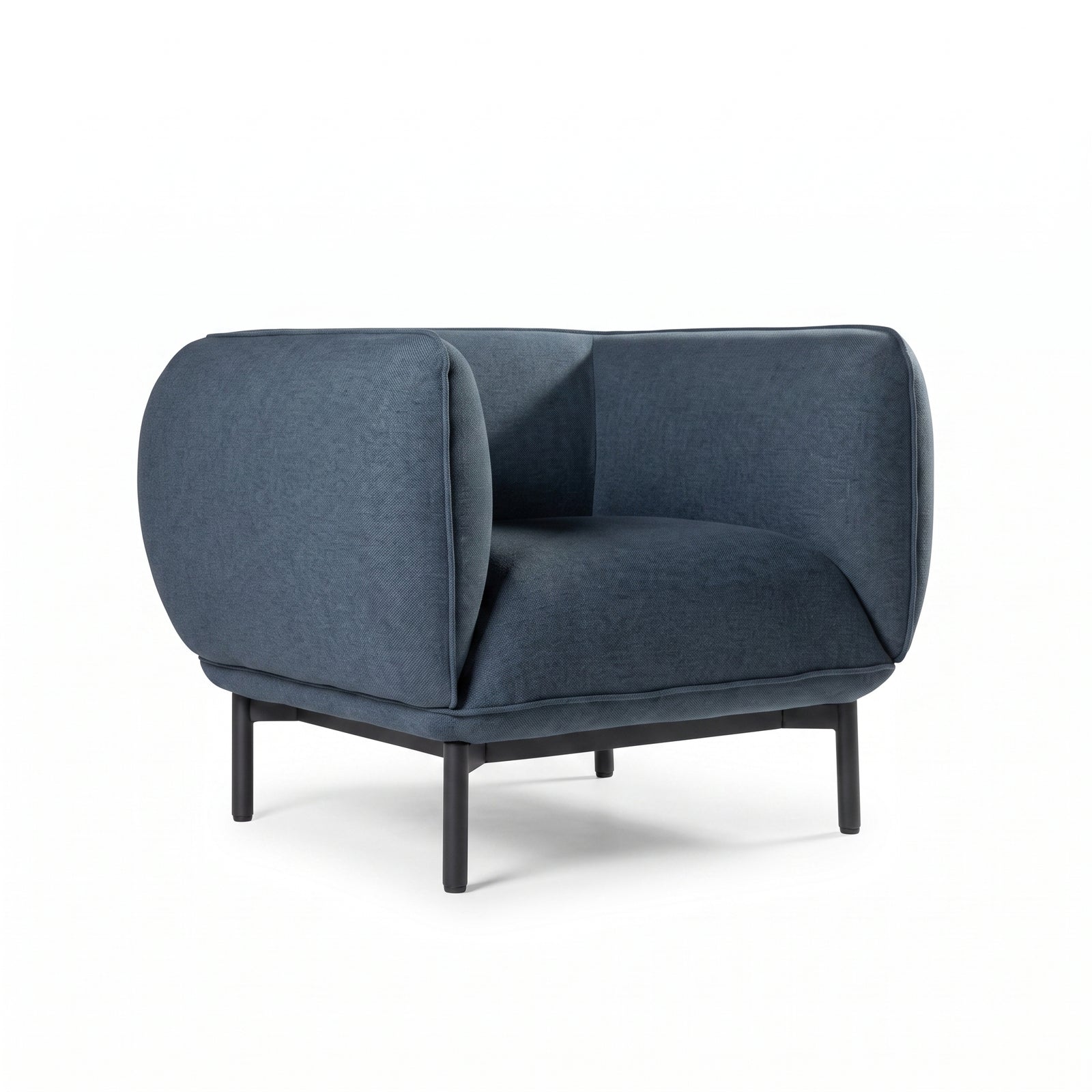 Sillón Sevilla tapizado en azul petróleo, vista tres cuartos sobre fondo blanco.